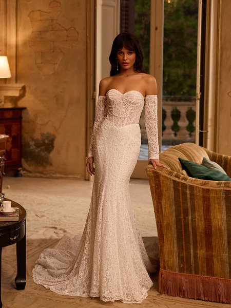 Moonlight Couture H1624 romantic lace wedding dresses with sleeves and beading make a statement.