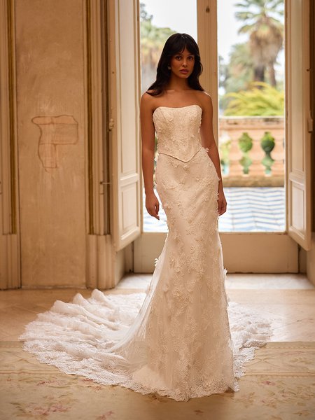 Moonlight Couture H1630 romantic lace wedding dresses with sleeves and beading make a statement.