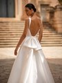 Low back V-neckline wedding dress with bow at back waistline