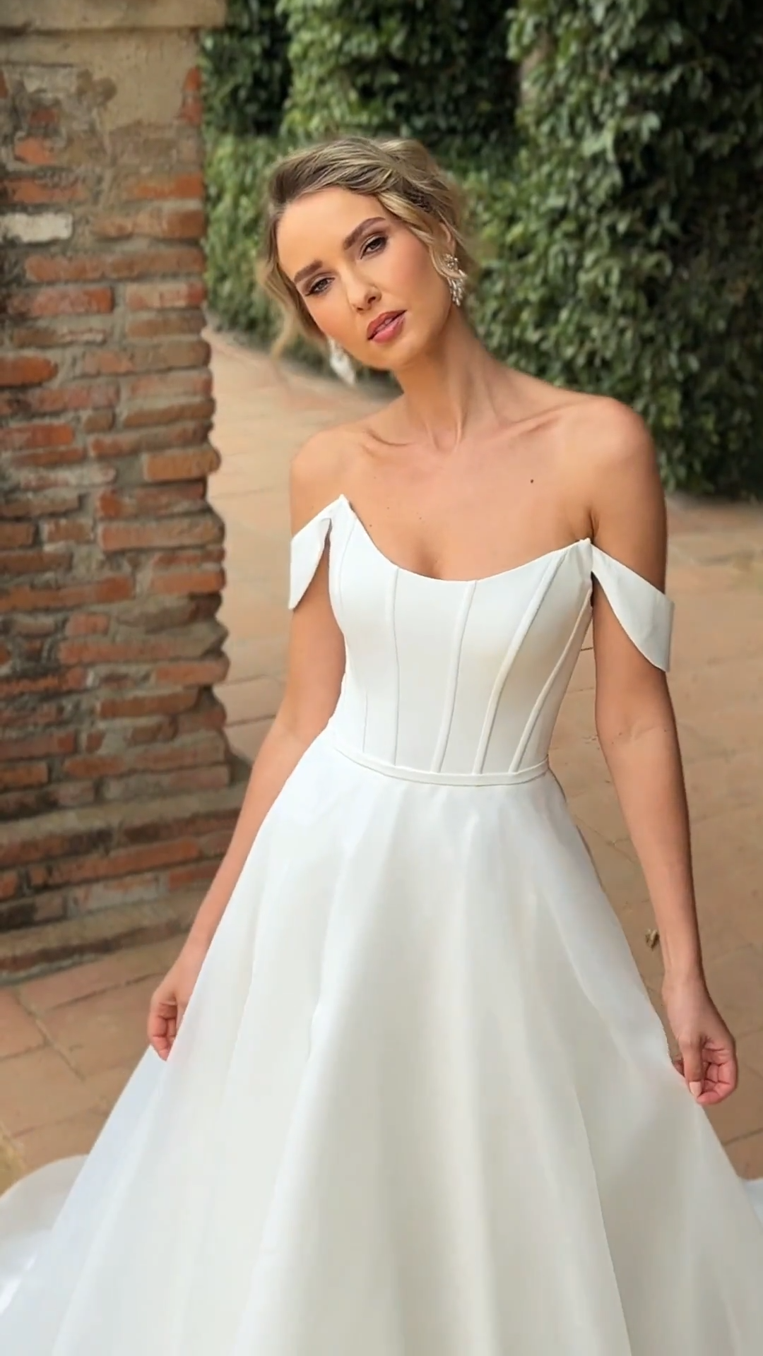 Video of Moonlight Tango T174 Detachable Swag Sleeves Regal Crepe Bodice and Organza Full A-Line Skirt Bridal Gown