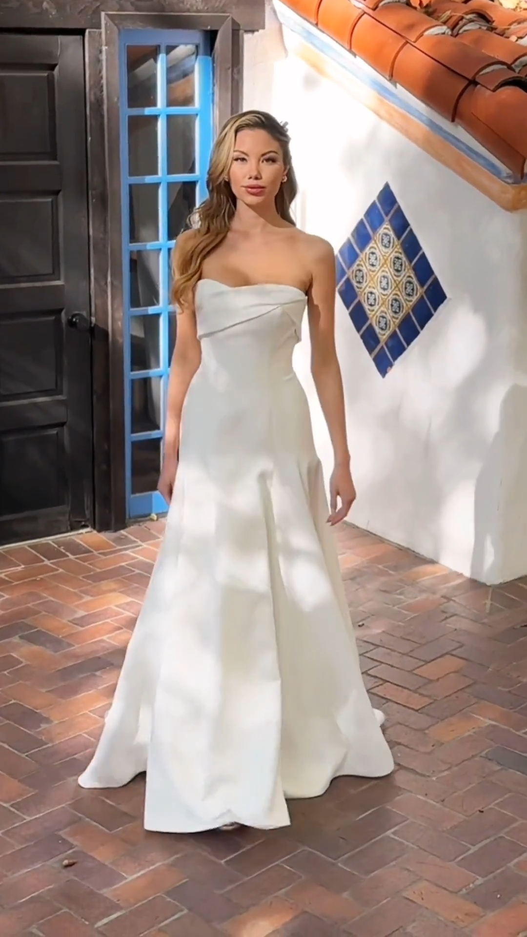 Video of Moonlight Tango T185 double face crepe fabric strapless fit and flare wedding gown