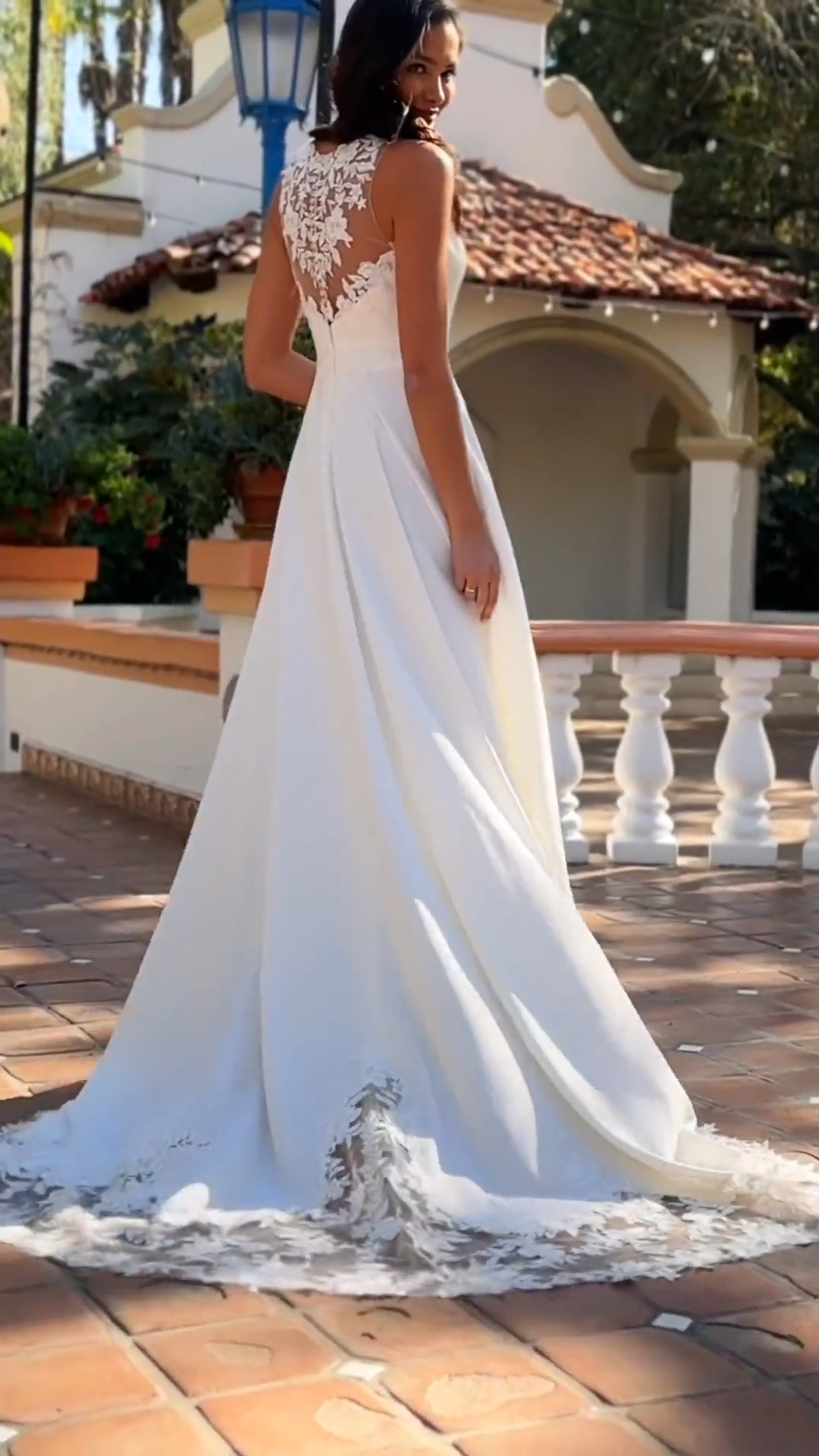 Video of crepe V-neck with illusion inset and net illusion bateau back A-line gown Moonlight Tango T188